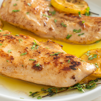 Cooked marinated chicken breasts