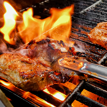 Close up image of a meat on grill
