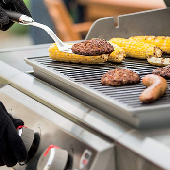 A man cooking on a grill