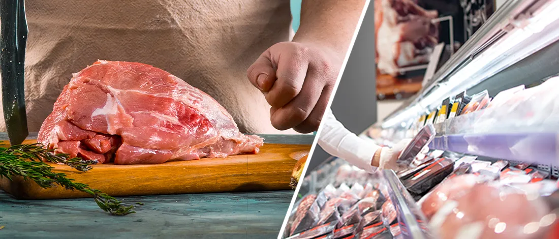 Butcher cutting a meat