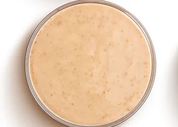 Gravy sauce on plain background