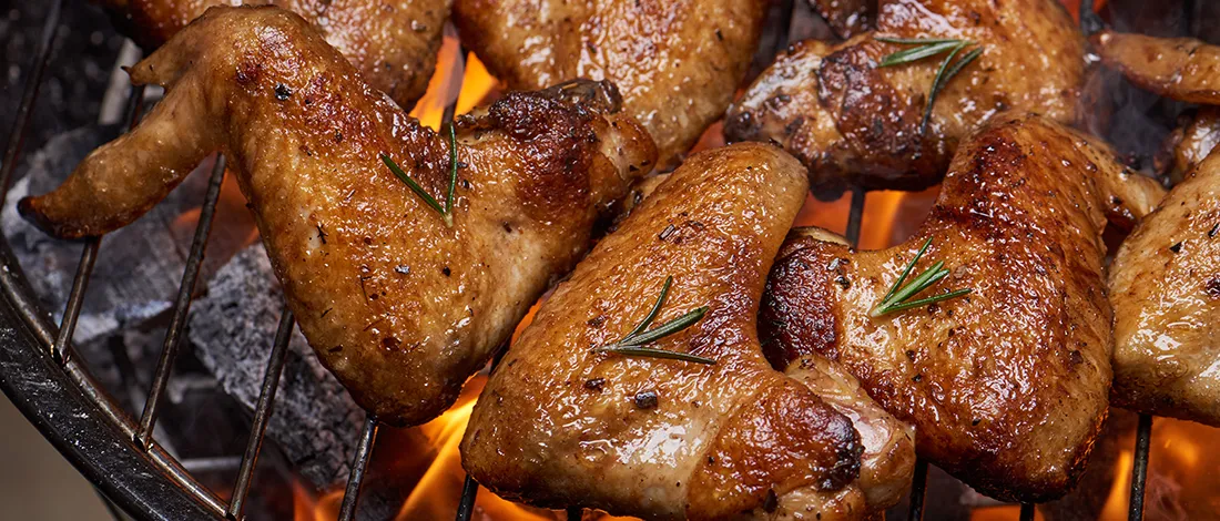 Grilling chicken close up image