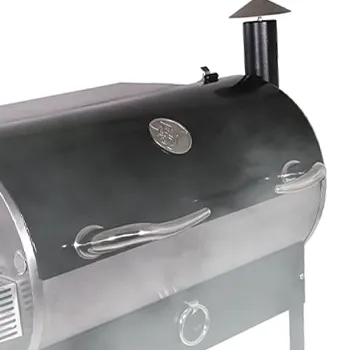 Pellet grill covered in a smoke
