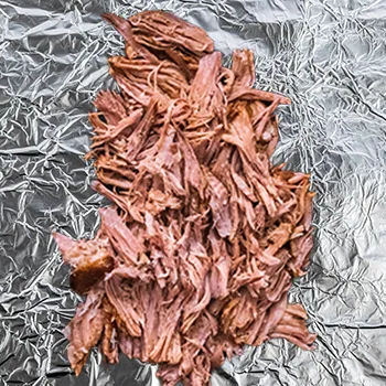 Pulled pork wrapped in an aluminum foil