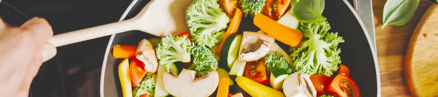 Cooking healthy meal on a pan