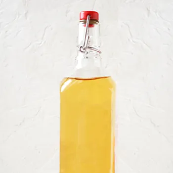 Apple cider vinegar plain background