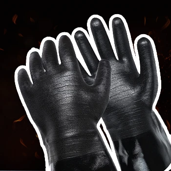 Artisan Griller glove product in fire flame black background