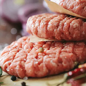 A raw burger beef close up image