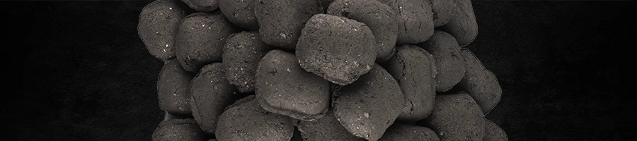 Top view of charcoal briquette black background