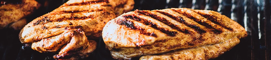 Chicken breast fillet on grill