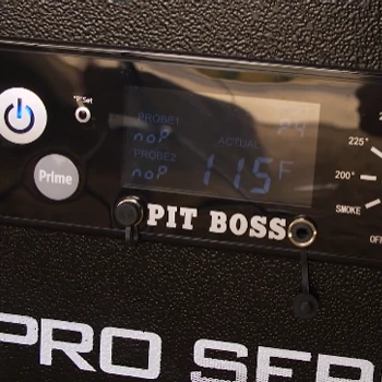 The interface of the Pitboss grill with buttons and screens