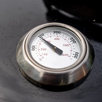 A built in grill smoker thermometer