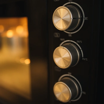 Oven machine with high temperature control close up image