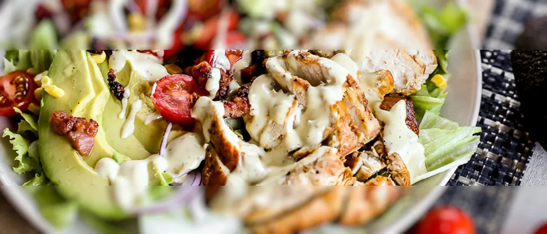 Paleo Honey Mustard Chicken Bacon and Avocado Salad on plate