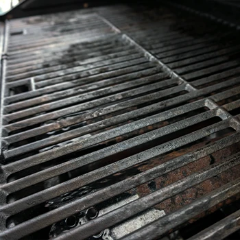 A dirty and rusty uncleaned grill