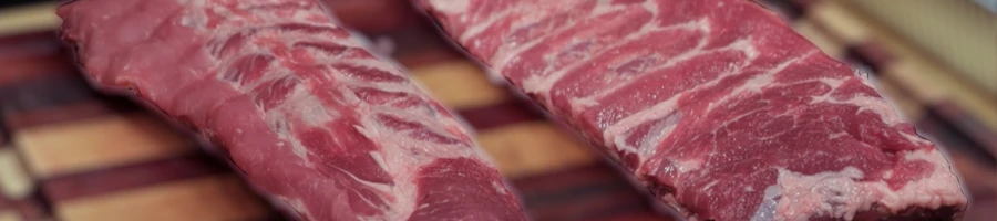 A raw baby ribs and spare ribs with blurred background