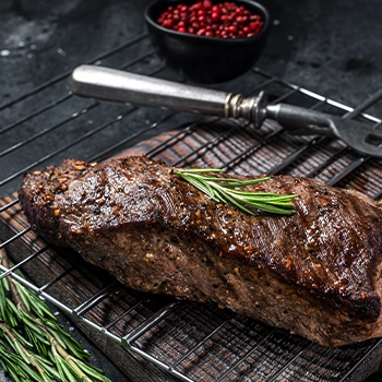 Tri tip steak on a grill