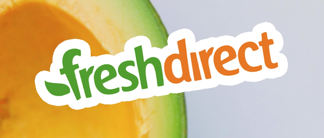 fresh direct logo with blurred sliced avocado on the background