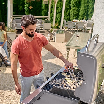 man grilling outdoors