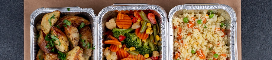 Top view of three different meals on a container