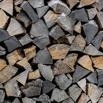 Stack pile of chopped oak wood logs
