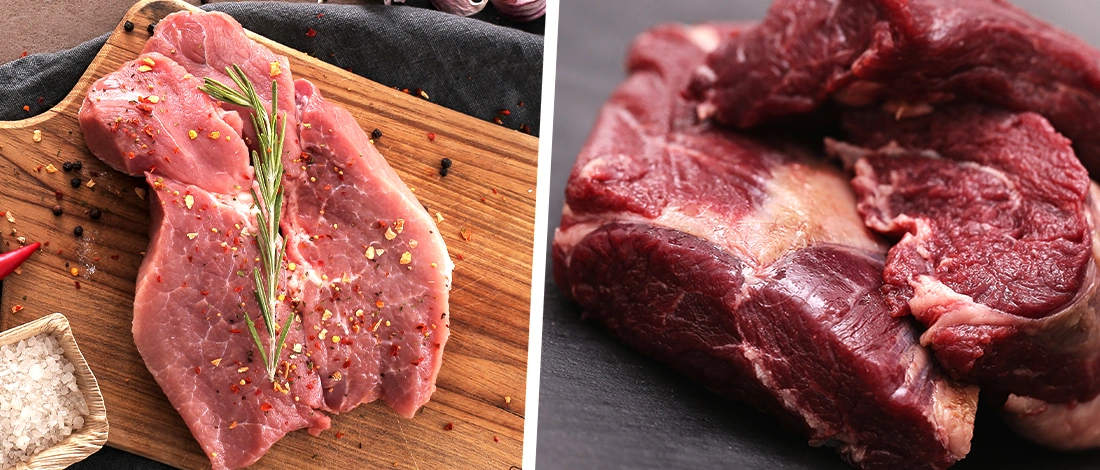 Raw meats on top of cutting board close up image