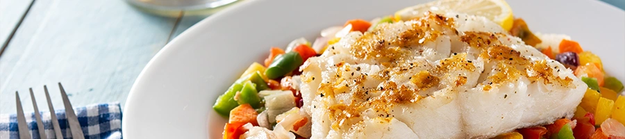 Freshly cooked and grilled Cod fish close up image