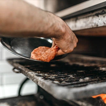 Putting patty inside the oven