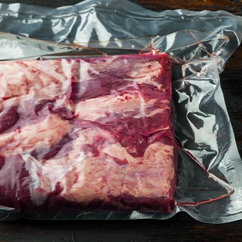 Brisket meat in a tight plastic