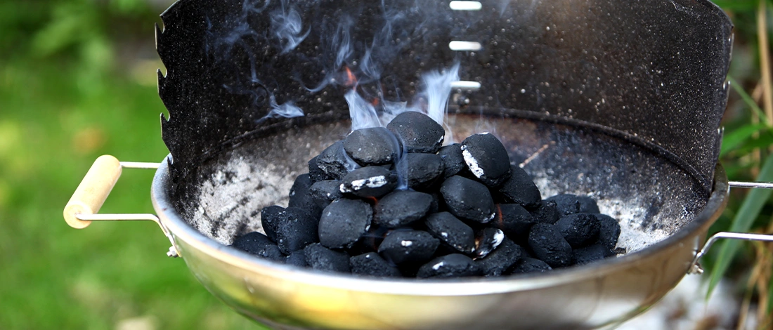 A charcoal inside a bbq grill