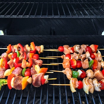 BBQ meats on top of a grill