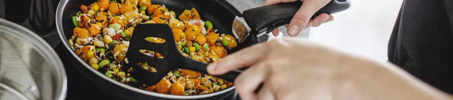 Using a spatula when cooking on a pan