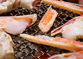 Crab legs on a grill