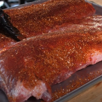 Marinated baby back ribs close up image