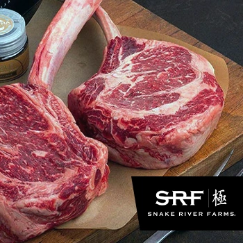 Snake River meat on cutting board with logo overlay