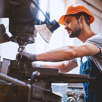 A man welding metal