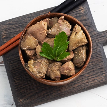 Top view of chicken liver and a chopsticks