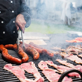 man meat grilling