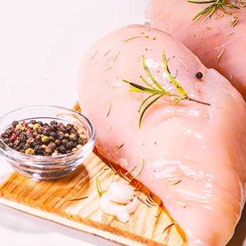 Raw chicken with herbs