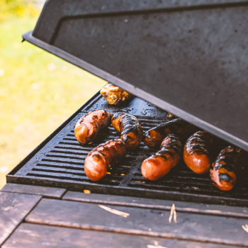 Sausages on a grill