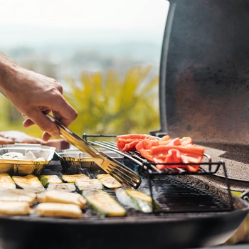 Grilling food on a portable grill