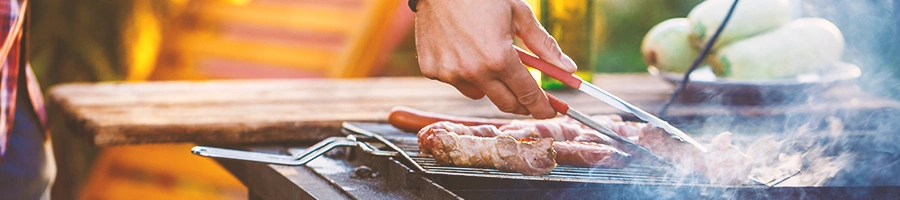 A person grilling food