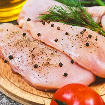 Raw chicken with herbs