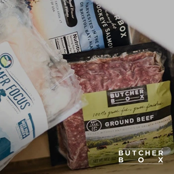 Close up image of Butcherbox product inside a box with logo overlay