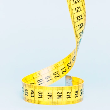 A measuring tape swirled up