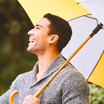 A man holding an umbrella