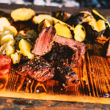 Smoked meat on a chopping board