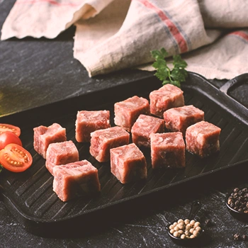 Wagyu cubes on a tray