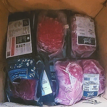 Packaged meat inside a box