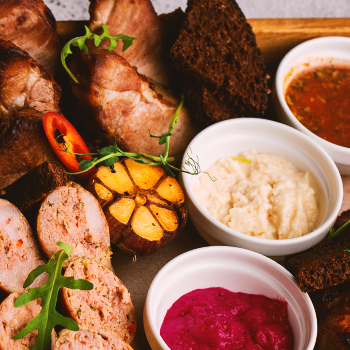 A tray of meat and condiments